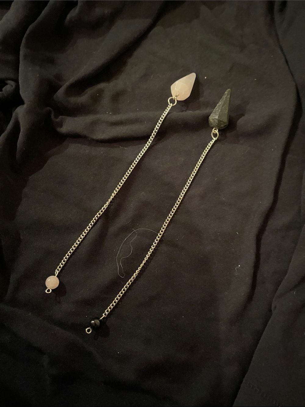 Pair of healing crystal pendulums